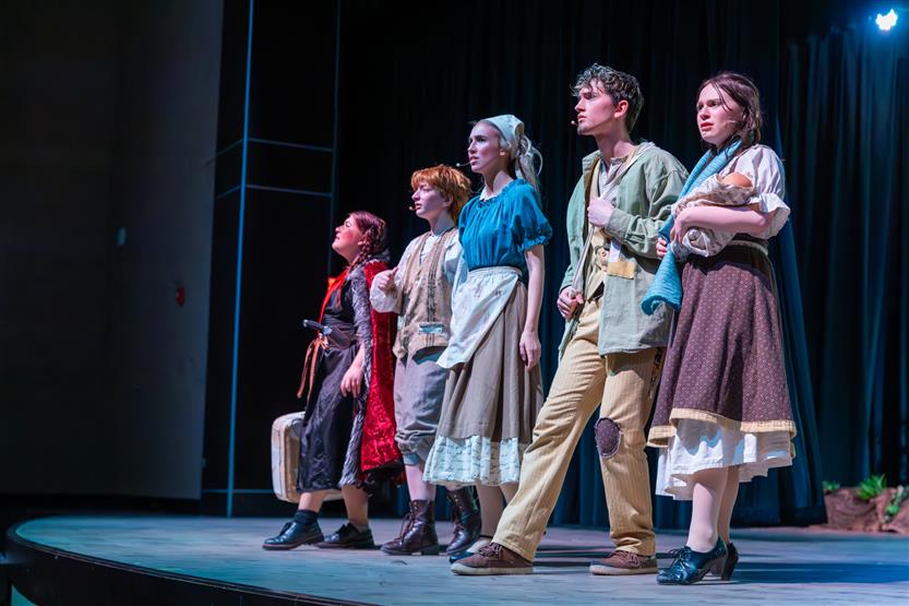 Students perform onstage